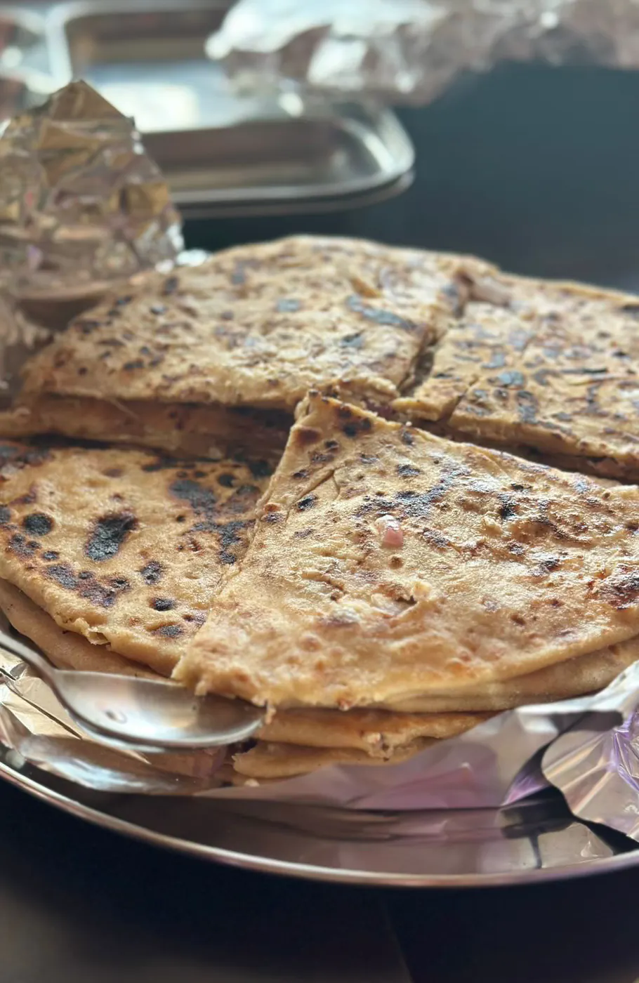 Stuffed flatbreads on a steel plate